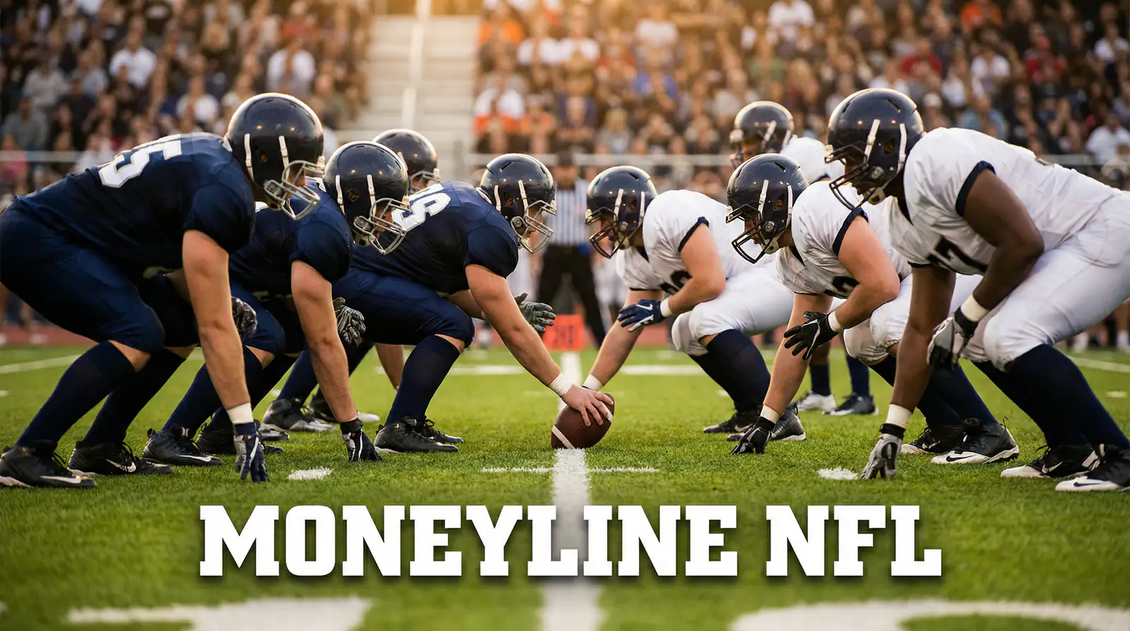 Dos equipos de fútbol americano enfrentados en la línea de scrimmage antes del snap en un estadio iluminado